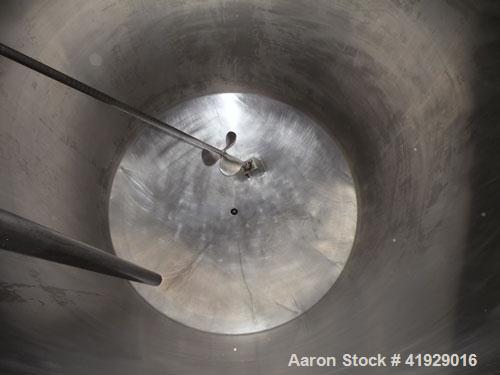 Used Norwalk Tank, 2000 Gallon, 316 Stainless Steel, Vertical. 76" diameter x 106" straight side, dished top and bottom. Top side wall entering angled Lightnin agitator, model N33G-300. 1-1/2" diamet...