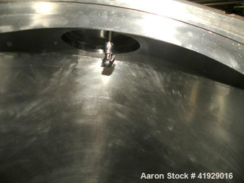 Used Norwalk Tank, 2000 Gallon, 316 Stainless Steel, Vertical. 76" diameter x 106" straight side, dished top and bottom. Top side wall entering angled Lightnin agitator, model N33G-300. 1-1/2" diamet...