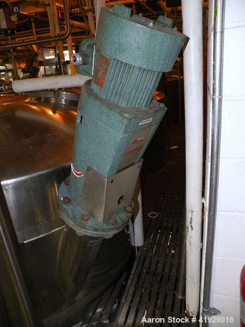 Used Norwalk Tank, 2000 Gallon, 316 Stainless Steel, Vertical. 76" diameter x 106" straight side, dished top and bottom. Top side wall entering angled Lightnin agitator, model N33G-300. 1-1/2" diamet...