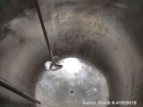 Used Norwalk Tank, 2000 Gallon,  Stainless Steel, Vertical. 76" diameter x 106" straight side, dished top and bottom. Off center top entering Lightnin agitator, model N33G-300. 1-1/2" diameter shaft ...