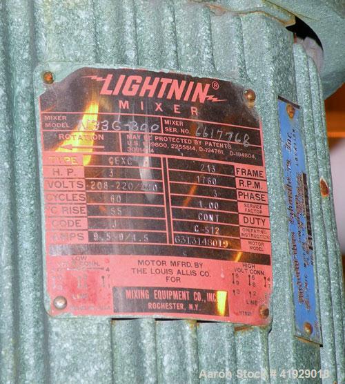Used Norwalk Tank, 2000 Gallon,  Stainless Steel, Vertical. 76" diameter x 106" straight side, dished top and bottom. Off center top entering Lightnin agitator, model N33G-300. 1-1/2" diameter shaft ...