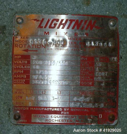 Used Norwalk Tank, 2000 Gallon,  Stainless Steel, Vertical. 76" diameter x 106" straight side, dished top and bottom. Off center top entering Lightnin agitator, model N33G-300. 1-1/2" diameter shaft ...