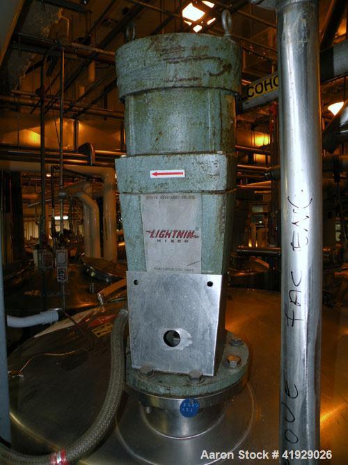 Used Norwalk Tank, 2000 Gallon,  Stainless Steel, Vertical. 76" diameter x 106" straight side, dished top and bottom. Off center top entering Lightnin agitator, model N33G-300. 1-1/2" diameter shaft ...