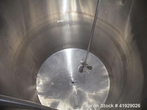 Used Norwalk Tank, 2000 Gallon,  Stainless Steel, Vertical. 76" diameter x 106" straight side, dished top and bottom. Off center top entering Lightnin agitator, model N33G-300. 1-1/2" diameter shaft ...