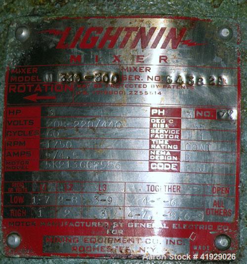 Used Norwalk Tank, 2000 Gallon,  Stainless Steel, Vertical. 76" diameter x 106" straight side, dished top and bottom. Off center top entering Lightnin agitator, model N33G-300. 1-1/2" diameter shaft ...