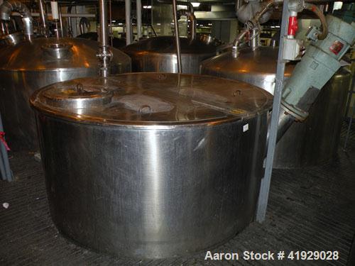 Used Norwalk Tank, 2000 Gallon,  stainless steel, vertical. 76" diameter x 106" straight side, open top with a 1/2 hinged cover, dish bottom. Top side wall entering angled Lightnin agitator, model N3...