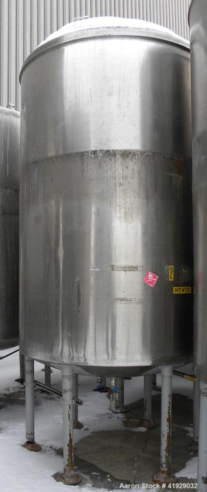 Used Norwalk Tank, 2000 Gallon, 316 Stainless Steel, Vertical. 76" diameter x 106" straight side, dished top and bottom. Off center top entering Lightnin agitator, model N33G-300. 1-1/2" diameter sha...