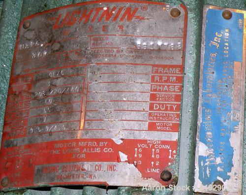 Used Norwalk Tank, 2000 Gallon, 316 Stainless Steel, Vertical. 76" diameter x 106" straight side, dished top and bottom. Off center top entering Lightnin agitator, model N33G-300. 1-1/2" diameter sha...