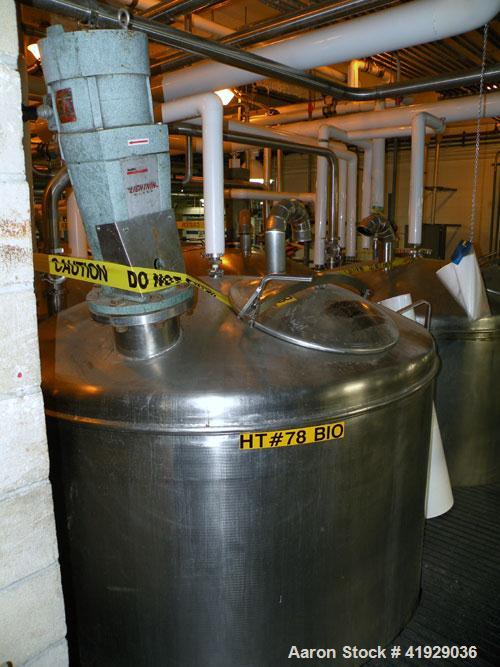 Used Norwalk Tank, 2000 Gallon,  Stainless Steel, Vertical. 76" diameter x 106" straight side, dished top and bottom. Off center top entering Lightnin agitator, model N33G-300. Driven by a 3hp, 3/60/...