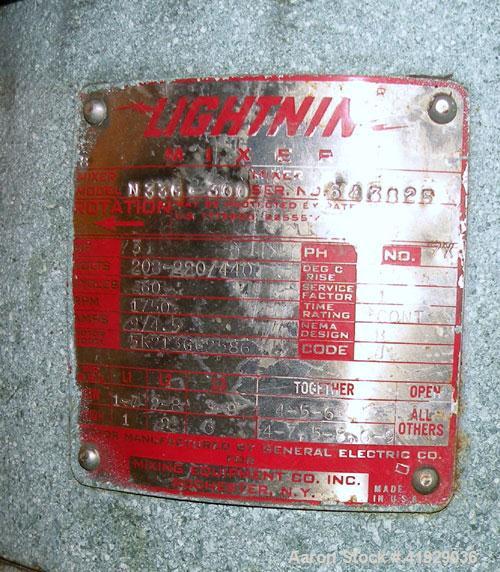 Used Norwalk Tank, 2000 Gallon,  Stainless Steel, Vertical. 76" diameter x 106" straight side, dished top and bottom. Off center top entering Lightnin agitator, model N33G-300. Driven by a 3hp, 3/60/...