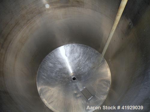 Used Norwalk Tank, 2000 Gallon, 316 stainless steel, vertical. 76" diameter x 108" straight side, dished 304 stainless steel top head, dished bottom. (1) Spray ball. Openings: top (2) 3-1/2", 4" tri-...