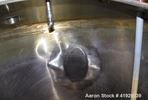 Used Norwalk Tank, 2000 Gallon, 316 stainless steel, vertical. 76" diameter x 108" straight side, dished 304 stainless steel top head, dished bottom. (1) Spray ball. Openings: top (2) 3-1/2", 4" tri-...