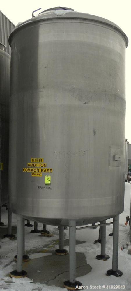 Used Norwalk Tank, 2000 Gallon, 316 Stainless Steel, Vertical. 76" diameter x 106" straight side, dished top and bottom. Top side wall entering angled Lightnin manual variable speed agitator, model N...
