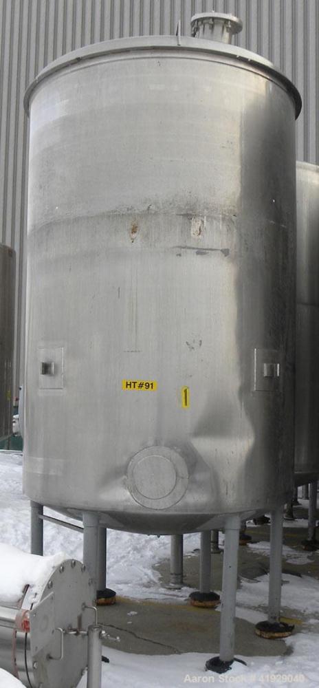 Used Norwalk Tank, 2000 Gallon, 316 Stainless Steel, Vertical. 76" diameter x 106" straight side, dished top and bottom. Top side wall entering angled Lightnin manual variable speed agitator, model N...