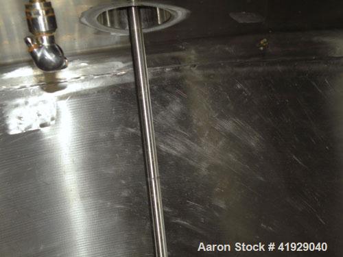Used Norwalk Tank, 2000 Gallon, 316 Stainless Steel, Vertical. 76" diameter x 106" straight side, dished top and bottom. Top side wall entering angled Lightnin manual variable speed agitator, model N...