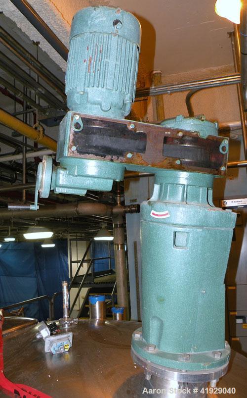 Used Norwalk Tank, 2000 Gallon, 316 Stainless Steel, Vertical. 76" diameter x 106" straight side, dished top and bottom. Top side wall entering angled Lightnin manual variable speed agitator, model N...