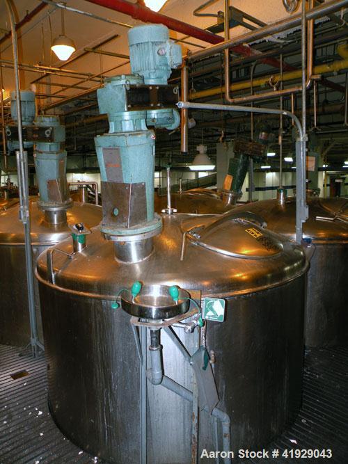 Used Norwalk Tank, 2000 Gallon,  stainless steel, vertical. 76" diameter x 106" straight side, dished top and bottom. Off center top entering angled Lightnin manual variable speed agitator, model N33...