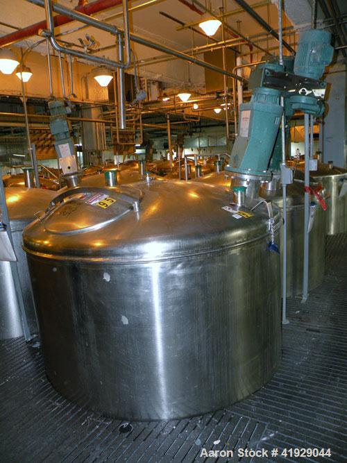 Used Norwalk Tank, 2000 Gallon,  Stainless Steel, Vertical. 76" diameter x 106" straight side, dished top and bottom. Off center top entering angled Lightnin manual variable speed agitator, model N33...