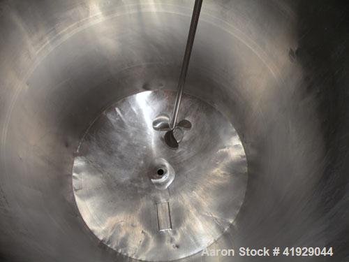 Used Norwalk Tank, 2000 Gallon,  Stainless Steel, Vertical. 76" diameter x 106" straight side, dished top and bottom. Off center top entering angled Lightnin manual variable speed agitator, model N33...