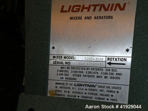 Used Norwalk Tank, 2000 Gallon,  Stainless Steel, Vertical. 76" diameter x 106" straight side, dished top and bottom. Off center top entering angled Lightnin manual variable speed agitator, model N33...