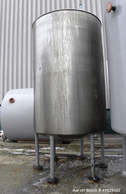 Used Norwalk Tank, 2000 Gallon, 316 Stainless Steel, Vertical. 76" Diameter x 108" straight side, dished 304 stainless steel top head, dished bottom. (1) Spray ball. Openings: top (2) 3-1/2", 4" tri-...