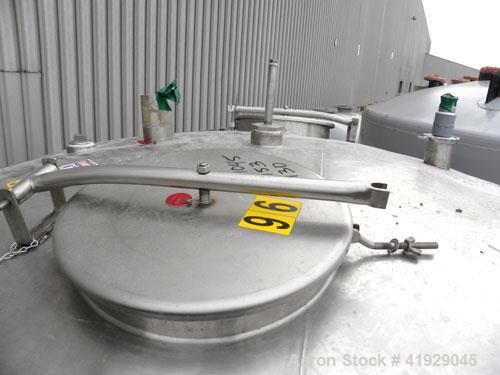 Used Norwalk Tank, 2000 Gallon, 316 Stainless Steel, Vertical. 76" Diameter x 108" straight side, dished 304 stainless steel top head, dished bottom. (1) Spray ball. Openings: top (2) 3-1/2", 4" tri-...