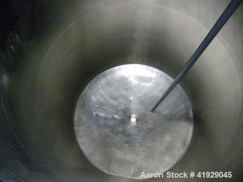 Used Norwalk Tank, 2000 Gallon, 316 Stainless Steel, Vertical. 76" Diameter x 108" straight side, dished 304 stainless steel top head, dished bottom. (1) Spray ball. Openings: top (2) 3-1/2", 4" tri-...