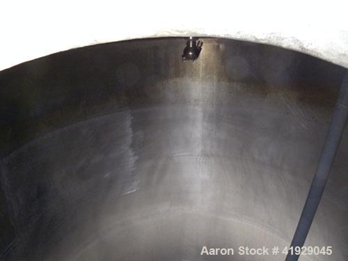 Used Norwalk Tank, 2000 Gallon, 316 Stainless Steel, Vertical. 76" Diameter x 108" straight side, dished 304 stainless steel top head, dished bottom. (1) Spray ball. Openings: top (2) 3-1/2", 4" tri-...