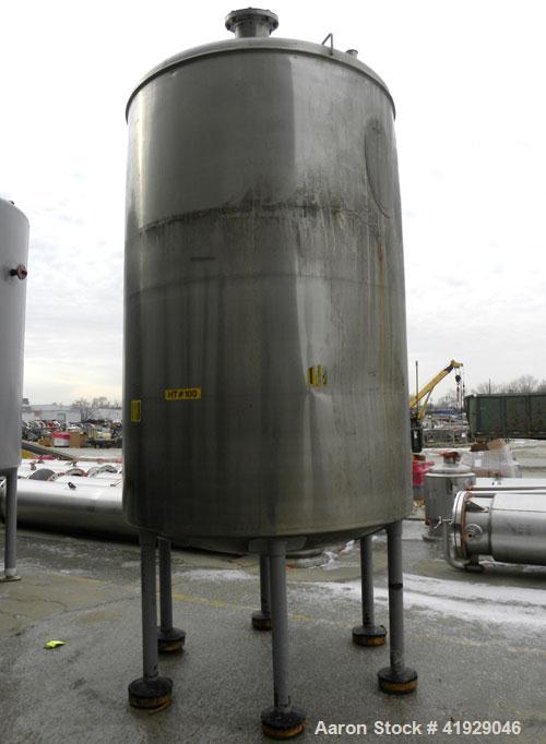Used Norwalk Tank, 2000 Gallon, 316 Stainless Steel, Vertical. 76" Diameter x 108" straight side, dished top and bottom. Openings: top 3" tri-clamp, 4" tri-clamp, 4" vent, 8" drive (capped), 24" manw...