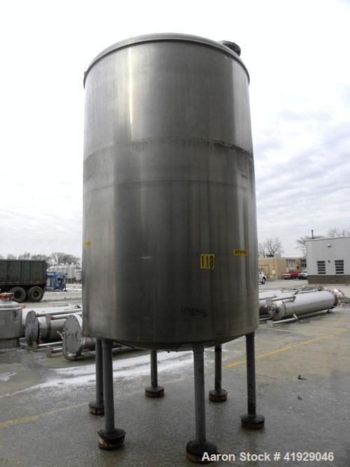 Used Norwalk Tank, 2000 Gallon, 316 Stainless Steel, Vertical. 76" Diameter x 108" straight side, dished top and bottom. Openings: top 3" tri-clamp, 4" tri-clamp, 4" vent, 8" drive (capped), 24" manw...