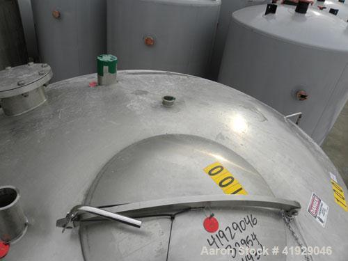 Used Norwalk Tank, 2000 Gallon, 316 Stainless Steel, Vertical. 76" Diameter x 108" straight side, dished top and bottom. Openings: top 3" tri-clamp, 4" tri-clamp, 4" vent, 8" drive (capped), 24" manw...