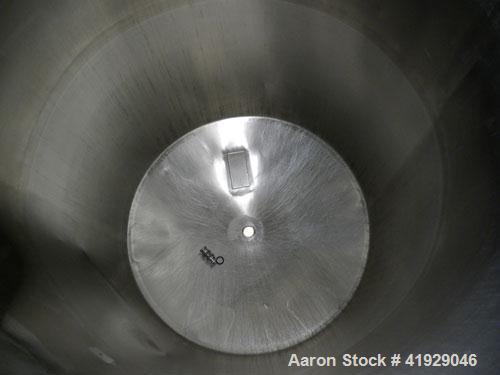 Used Norwalk Tank, 2000 Gallon, 316 Stainless Steel, Vertical. 76" Diameter x 108" straight side, dished top and bottom. Openings: top 3" tri-clamp, 4" tri-clamp, 4" vent, 8" drive (capped), 24" manw...