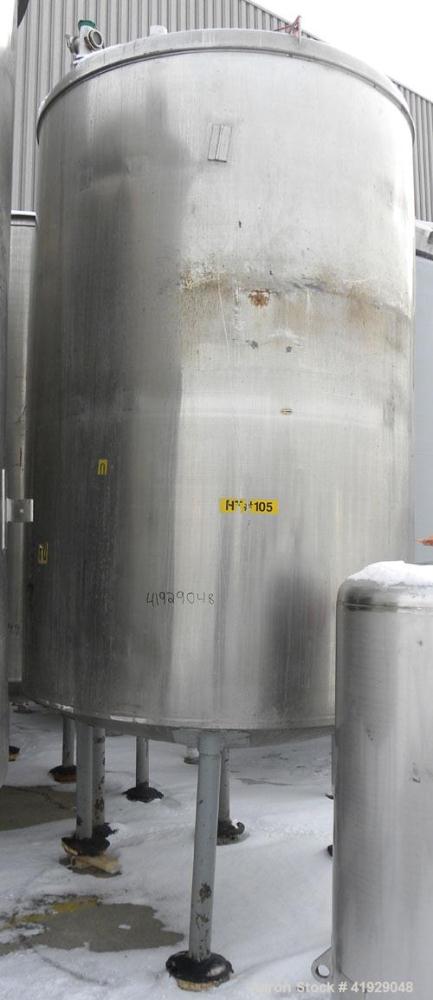 Used Norwalk Tank, 2000 Gallon, 316 stainless steel, vertical. 76" diameter x 108" straight side, dished 304 stainless steel top head, dished bottom. (1) Spray ball. Openings: top (2) 3-1/2", 4" tri-...