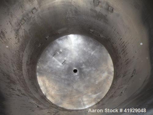 Used Norwalk Tank, 2000 Gallon, 316 stainless steel, vertical. 76" diameter x 108" straight side, dished 304 stainless steel top head, dished bottom. (1) Spray ball. Openings: top (2) 3-1/2", 4" tri-...