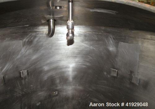 Used Norwalk Tank, 2000 Gallon, 316 stainless steel, vertical. 76" diameter x 108" straight side, dished 304 stainless steel top head, dished bottom. (1) Spray ball. Openings: top (2) 3-1/2", 4" tri-...