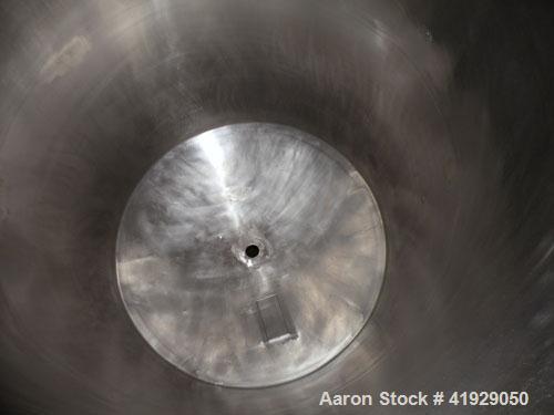Used Norwalk Tank, 2000 Gallon, Stainless Steel, Vertical. 76" Diameter x 106" straight side, dished 304 stainless steel top head, dished bottom. Openings: top 3" tri-clamp, 4" tri-clamp, 4" vent, 8"...