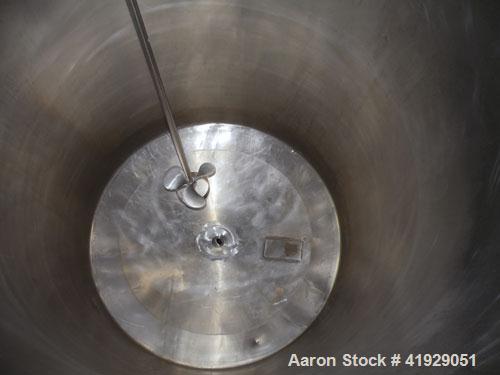 Used Norwalk Tank, 2000 Gallon,  Stainless Steel, Vertical. 76" diameter x 106" straight side, dished top and bottom. Off center top entering angled Lightnin manual variable speed agitator, model N33...