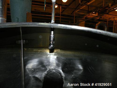 Used Norwalk Tank, 2000 Gallon,  Stainless Steel, Vertical. 76" diameter x 106" straight side, dished top and bottom. Off center top entering angled Lightnin manual variable speed agitator, model N33...