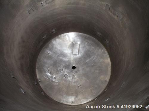 Used Norwalk Tank, 2000 Gallon, stainless steel, vertical. 76" diameter x 106" straight side, dished top and bottom. Openings: top 3", 4", 4" tri-clamp, 4" vent, (2) 18" manway with cover; approximat...