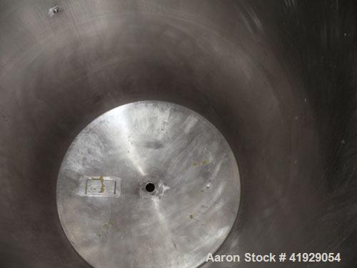 Used Norwalk Tank, 2000 Gallon, stainless steel, vertical. 76" Diameter x 106" straight side, dished top and bottom. Openings: top 3", 4", 4" tri-clamp, 4" vent, (2) 18" manway with cover; approximat...