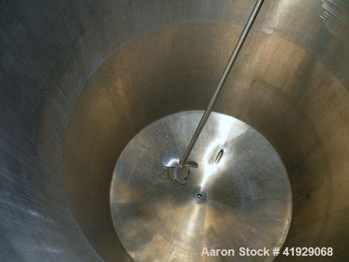 Used Norwalk Tank, 2000 Gallon,  stainless steel, vertical. 76" diameter x 106" straight side, dished top and bottom. Top side wall entering angled Lightnin manual variable speed agitator, model N33G...