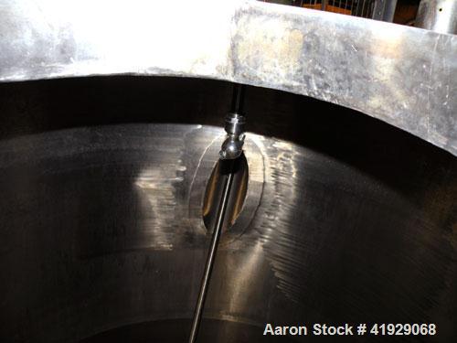 Used Norwalk Tank, 2000 Gallon,  stainless steel, vertical. 76" diameter x 106" straight side, dished top and bottom. Top side wall entering angled Lightnin manual variable speed agitator, model N33G...
