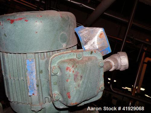 Used Norwalk Tank, 2000 Gallon,  stainless steel, vertical. 76" diameter x 106" straight side, dished top and bottom. Top side wall entering angled Lightnin manual variable speed agitator, model N33G...