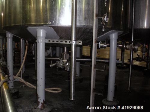 Used Norwalk Tank, 2000 Gallon,  stainless steel, vertical. 76" diameter x 106" straight side, dished top and bottom. Top side wall entering angled Lightnin manual variable speed agitator, model N33G...