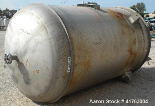 Used Mueller Pressure Tank, 2000 Gallon, Model F, 316L Stainless Steel, Vertical. 72" diameter x 105" straight side, 2 to 1 elliptical top and bottom. Internal rated 100/FV psi at 350 deg.f., -20 deg...