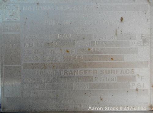 Used Mueller Pressure Tank, 2000 Gallon, Model F, 316L Stainless Steel, Vertical. 72" diameter x 105" straight side, 2 to 1 elliptical top and bottom. Internal rated 100/FV psi at 350 deg.f., -20 deg...