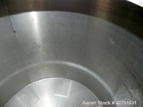 Used Perma-San Tank, 2000 Gallon, Model CVC, 304 Stainless Steel Vertical. 84" Diameter x 80" straight side. Dished top, coned bottom. Openings top (2) 2", 4", 18" man way with cover, side 2". 3" Tri...
