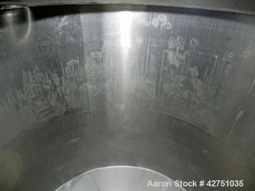 Used Perma-San Tank, 2000 Gallon, Model CVC, 304 Stainless Steel Vertical. 84" Diameter x 80" straight side. Dished top, coned bottom. Openings top (3) 2", 4", 18" man way with cover, side 2". 3" Tri...