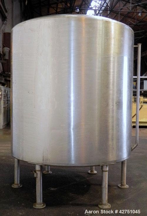 Used Perma-San Tank, 2000 Gallon, Model CVC, 304 Stainless Steel Vertical. 84" Diameter x 80" straight side. Dished top, coned bottom. Openings top 2", 4", 18" man way with cover, side 2". 3" Tri-cla...