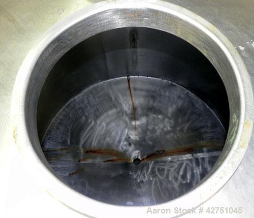 Used Perma-San Tank, 2000 Gallon, Model CVC, 304 Stainless Steel Vertical. 84" Diameter x 80" straight side. Dished top, coned bottom. Openings top 2", 4", 18" man way with cover, side 2". 3" Tri-cla...